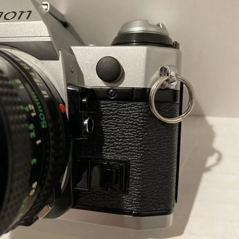Canon Silver and Black Film Camera Kit with Lenses and Flash
